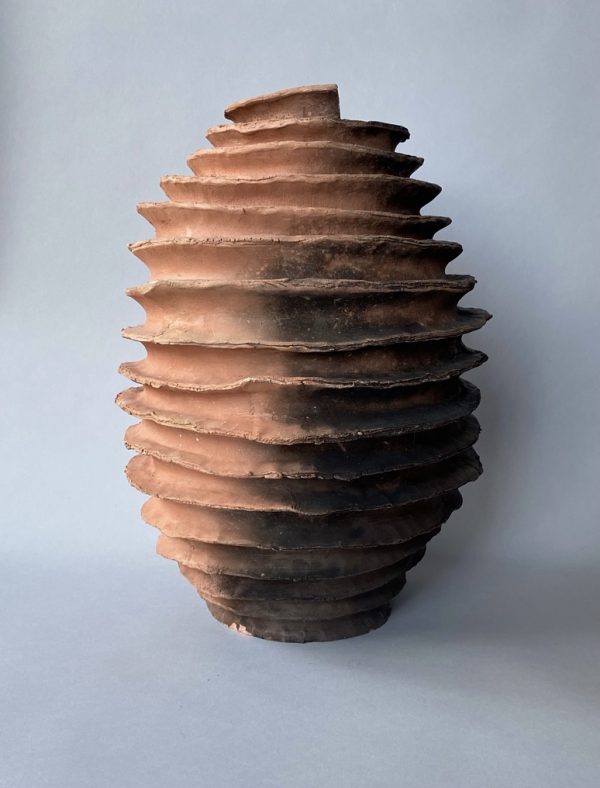 Spiral hand built earthenware oval jar by Reuben Sinha