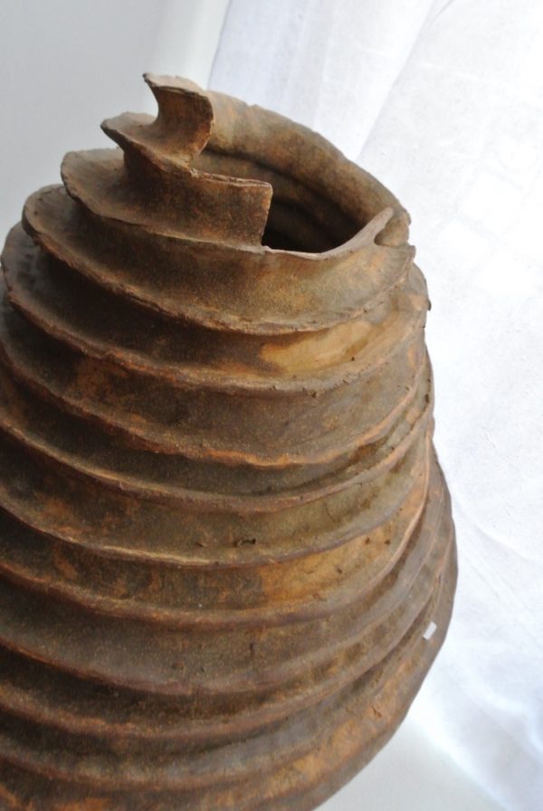 Spiral stoneware vase by Reuben Sinha