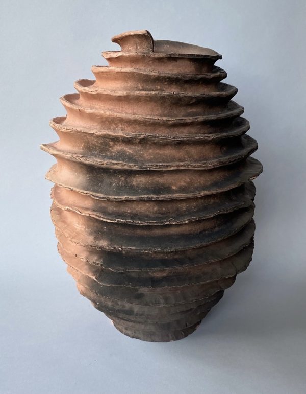 Spiral hand built earthenware oval jar by Reuben Sinha